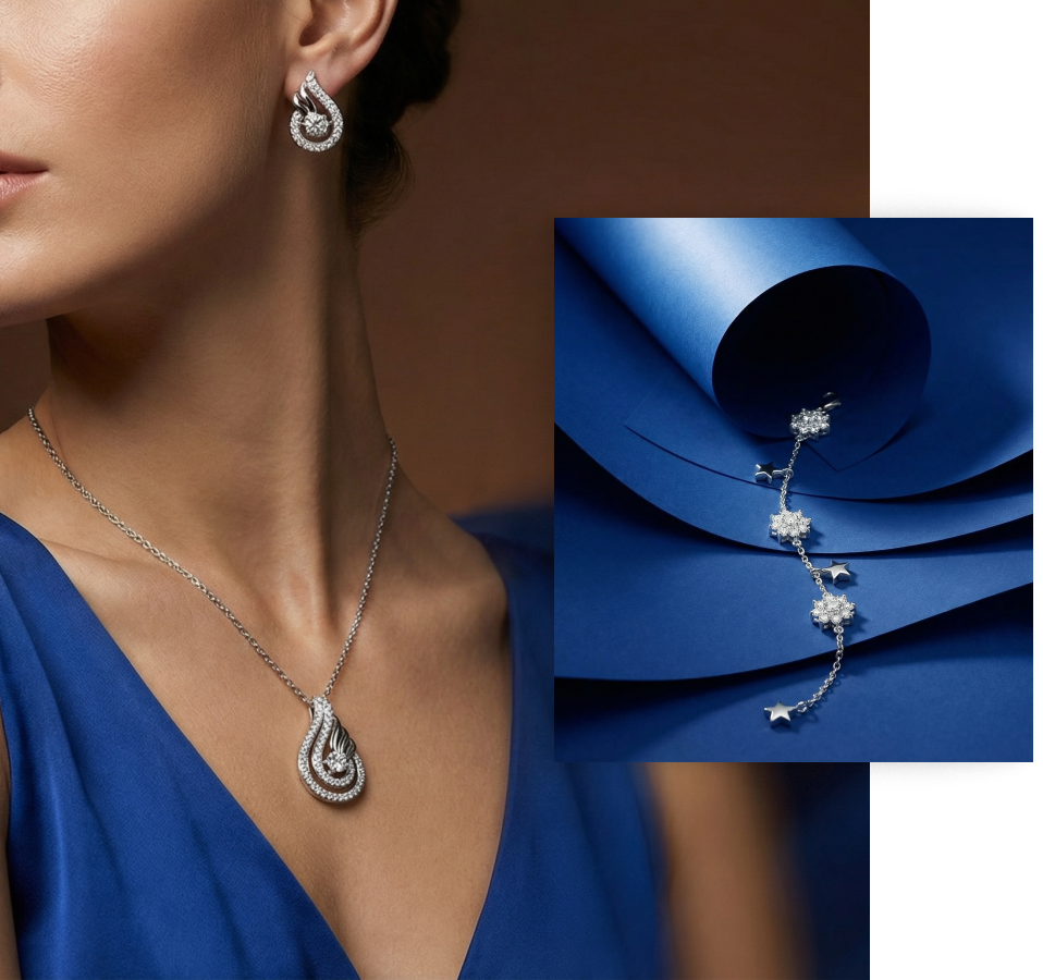 Silver Jems model wearing a silver pendant and earrings alongside a star bracelet on blue satin fabric