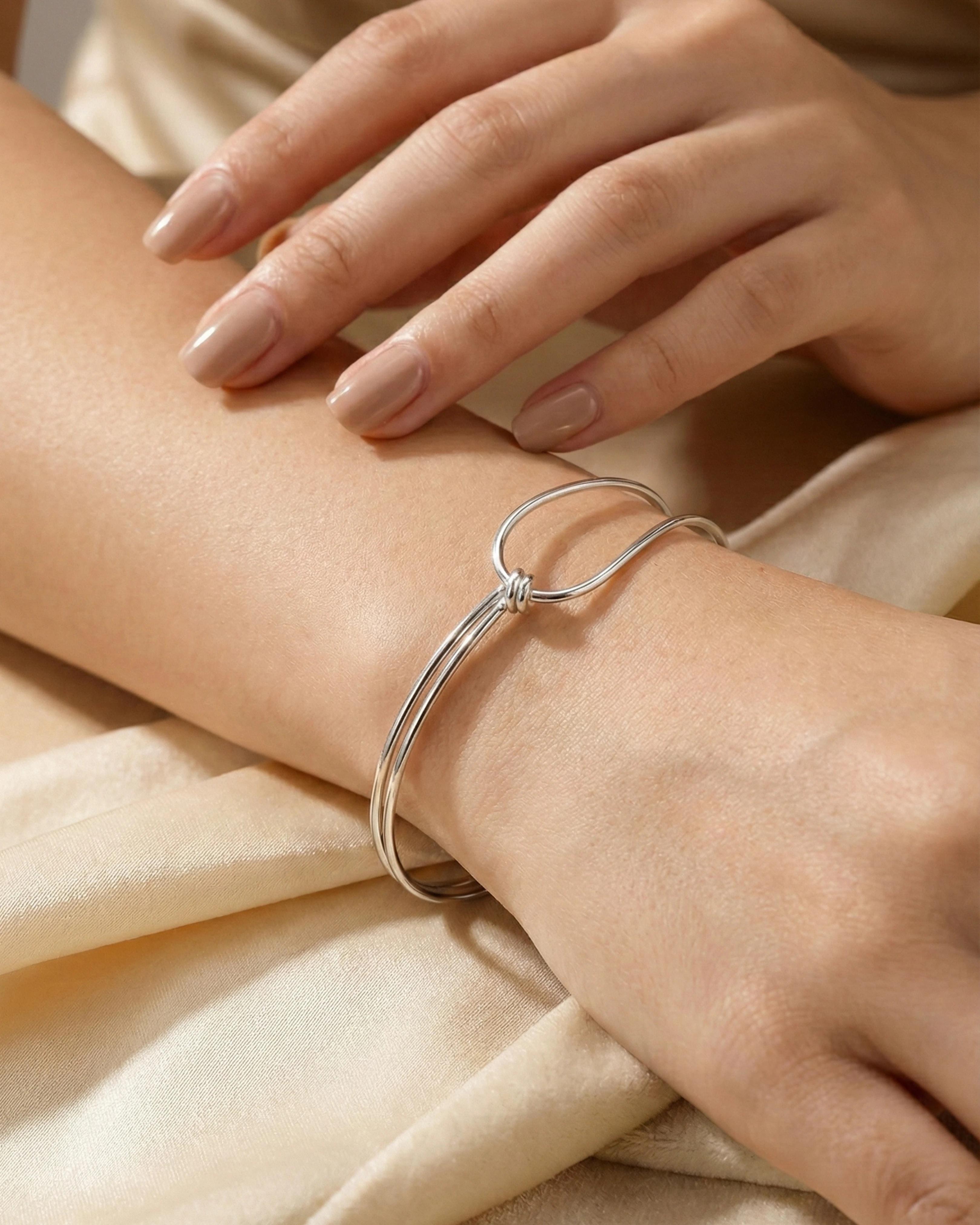 Infinity Knot Minimalist Bangle – 925 Sterling Silver - model