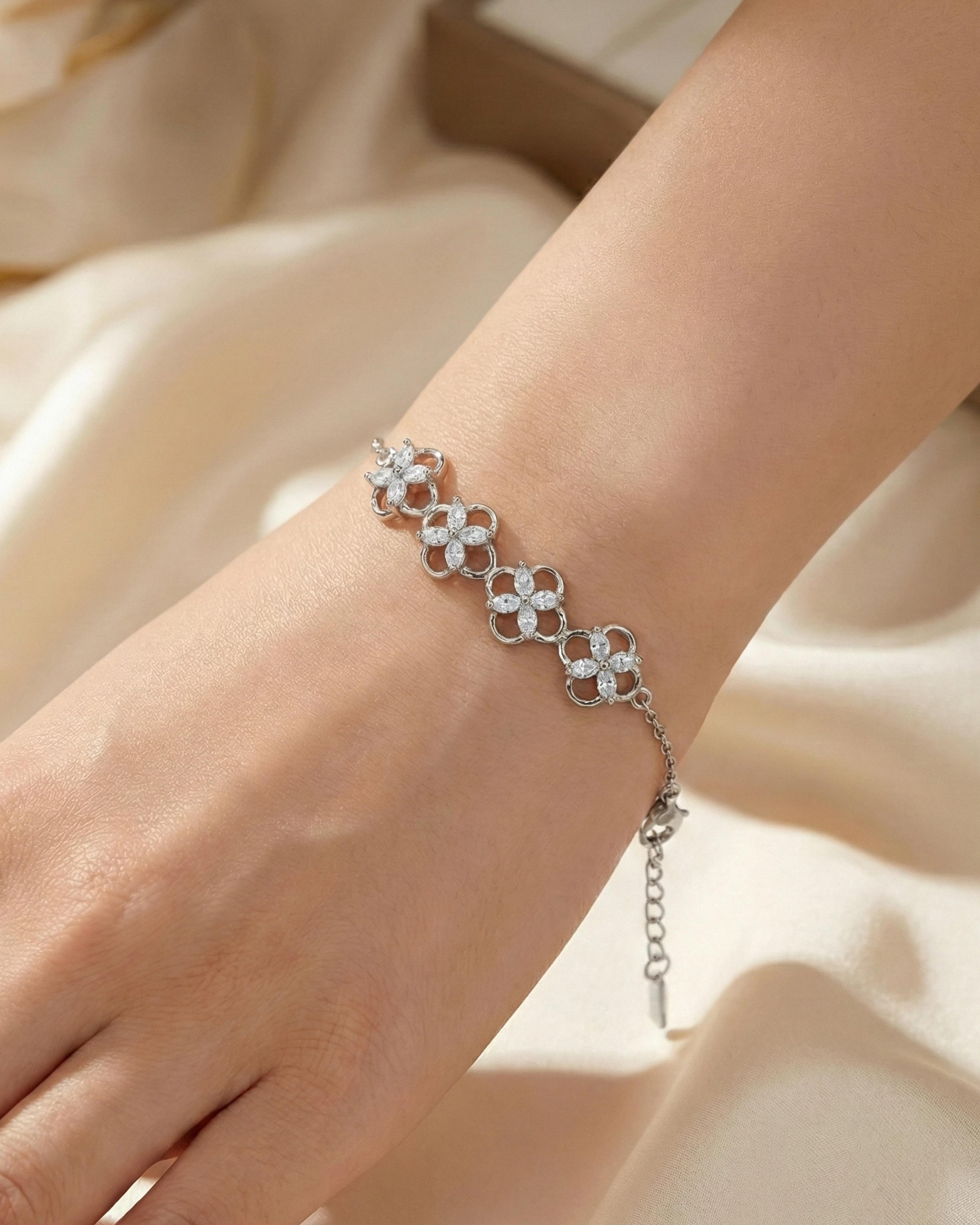 Floral BlossGolden Meadow Quatrefoil Bracelet – 925 Sterling Silverom Rose Quartz & Pearl Wrap Ring – 925 Sterling Silver - model